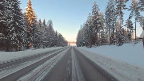 speeding winter drive pov on finland's icy highways and frozen landscape