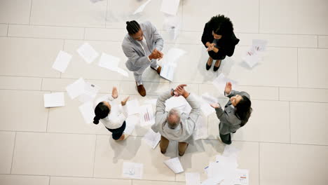 celebration from above, business people throwing