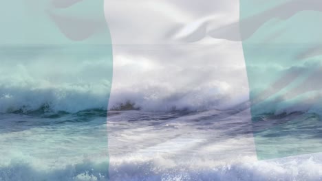 animation of flag of nigeria waving over crashing waves in sea