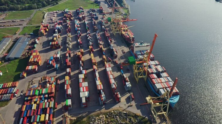 Aerial view of bustling container port, vibrant shipping and industrial activity
