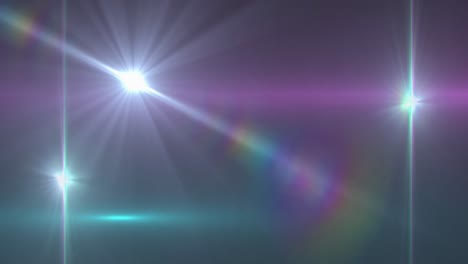 tres puntos de luz contra un fondo púrpura