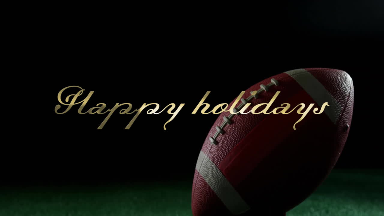 Animazione del testo "Buone Feste" su una palla da rugby posizionata su un supporto a terra