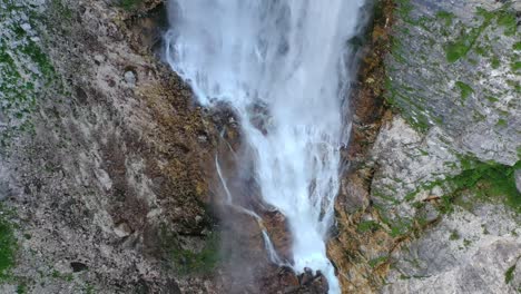 flying towards the edge of a waterfall