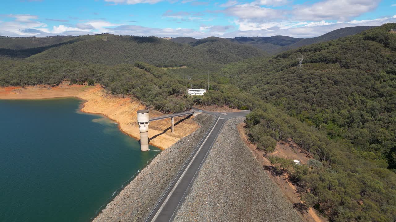 Approaching aerial views over the Blowering Dam and Reservoir, New South Wales alpine region.