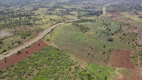drone view-aerial view of the drone over the agricultural land in the village of africa kenya