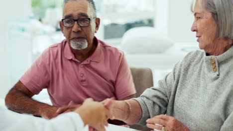 Shaking-hands,-meeting-and-senior-couple