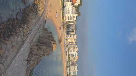 vertical video of the main square of blanes on the costa brava, prores copy space