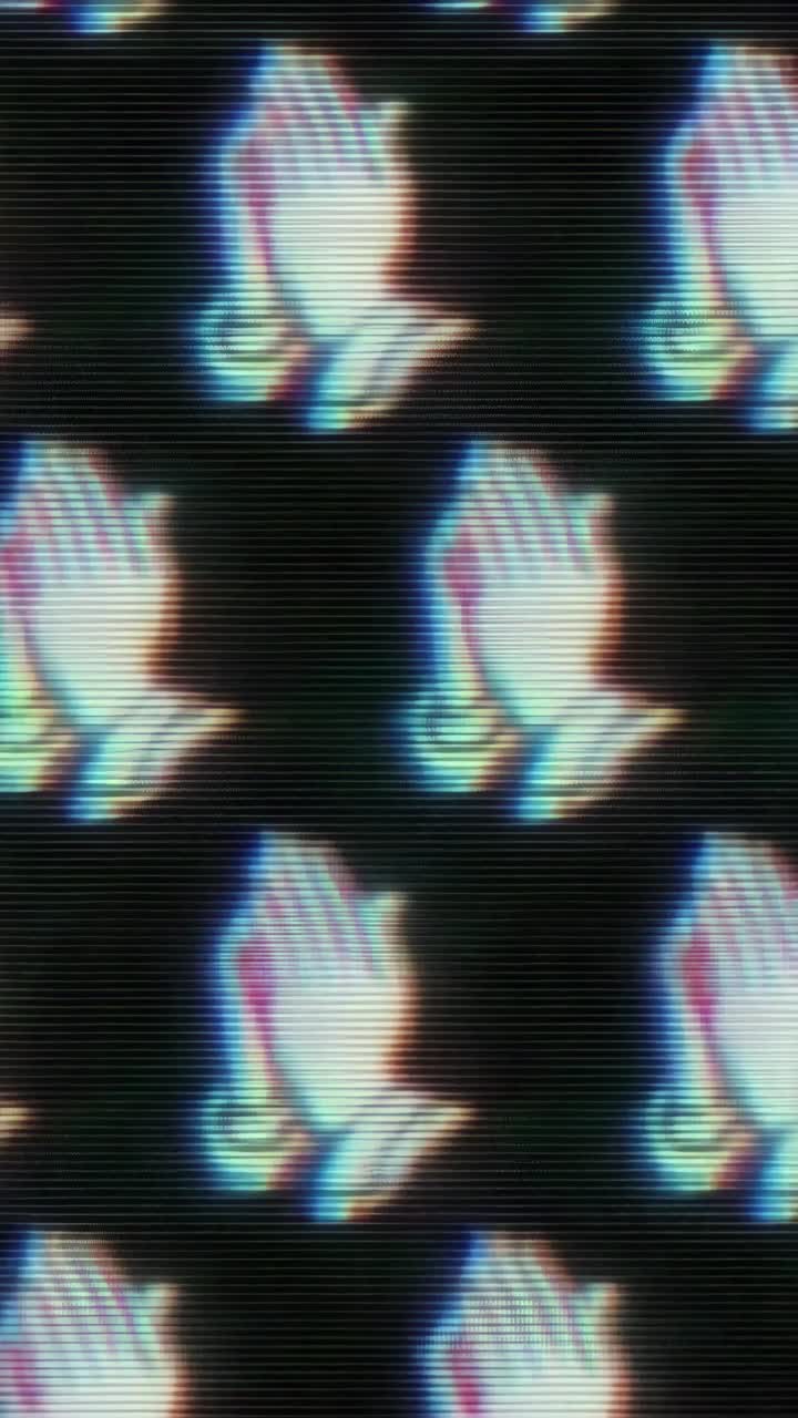 Retro video style image of praying hands with a VHS glitch effect