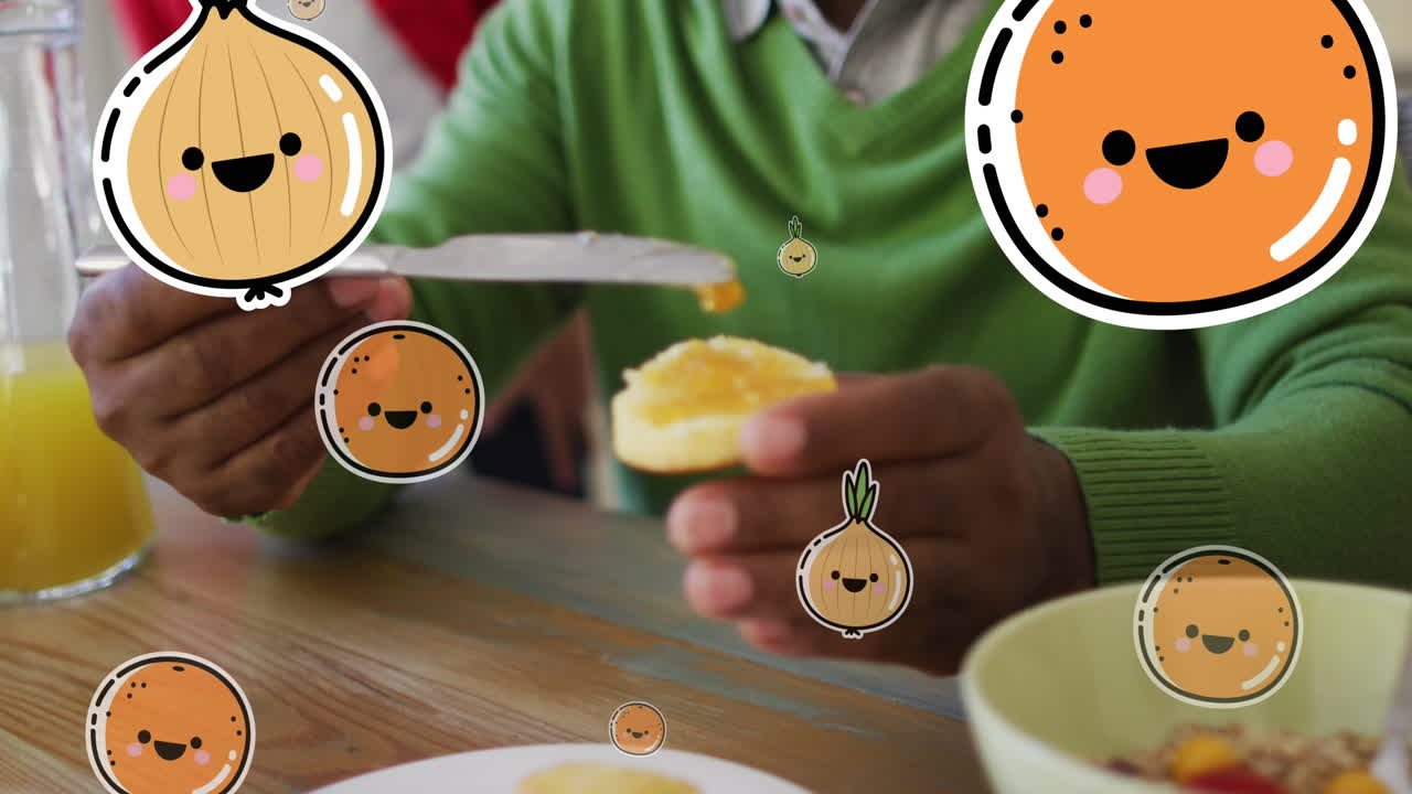 Animation of smiling vegetables and fruits over happy african american senior man eating at home