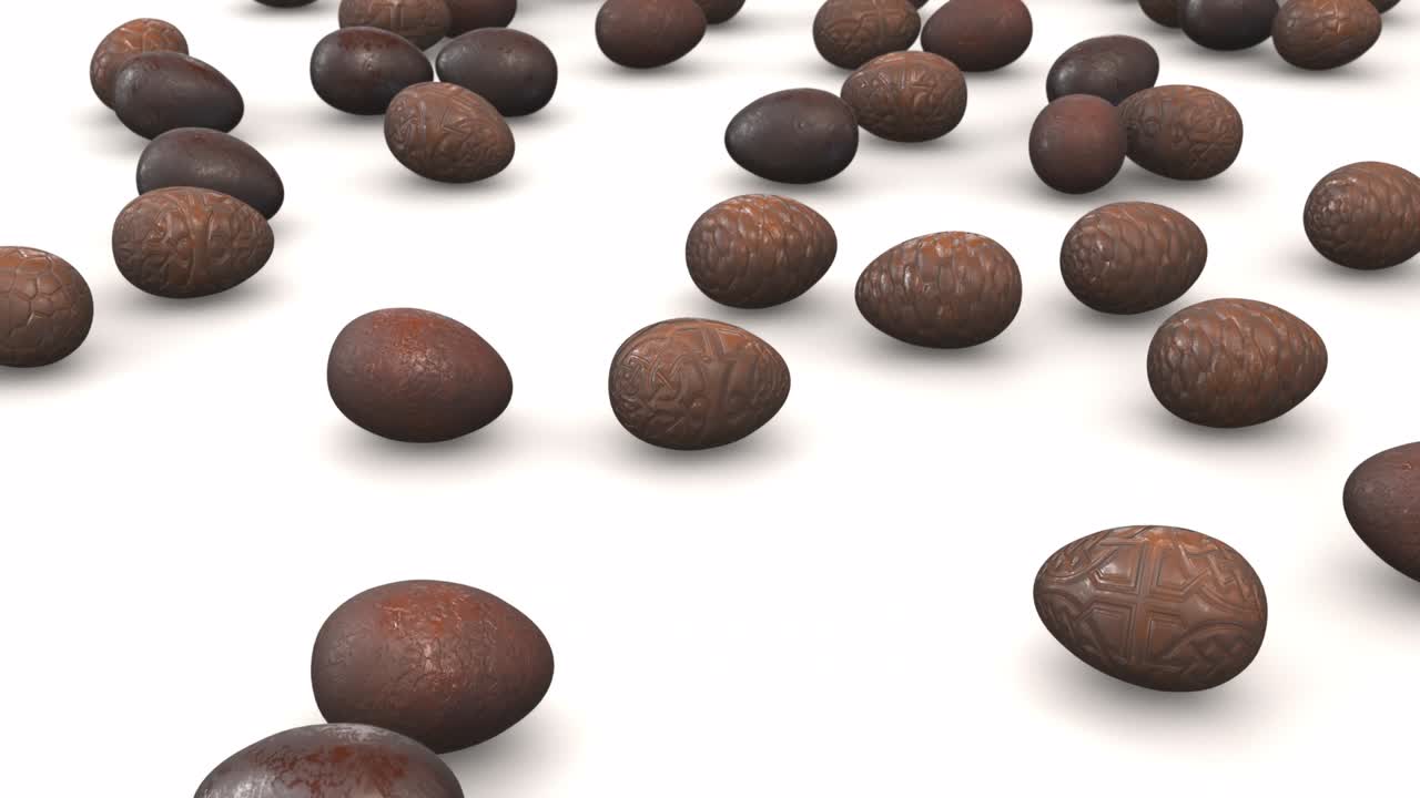 huevos de pascua de chocolate rodando por la pendiente