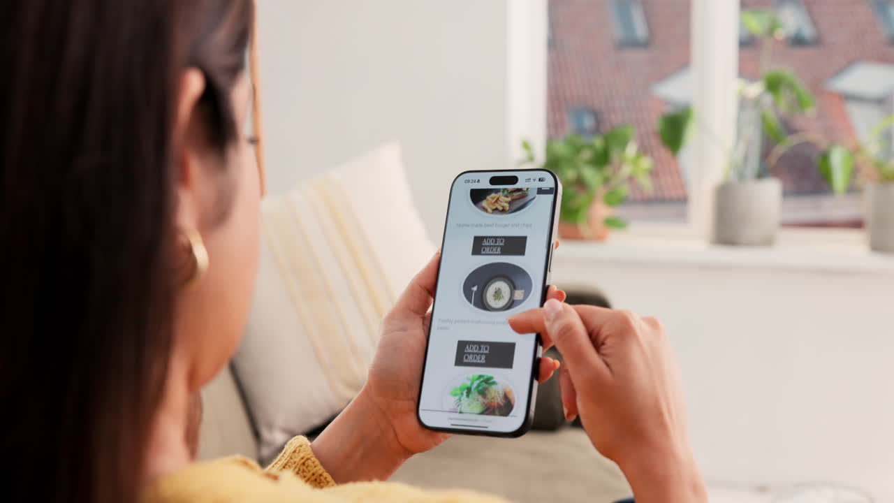 Woman Using Food Delivery App on Mobile Phone