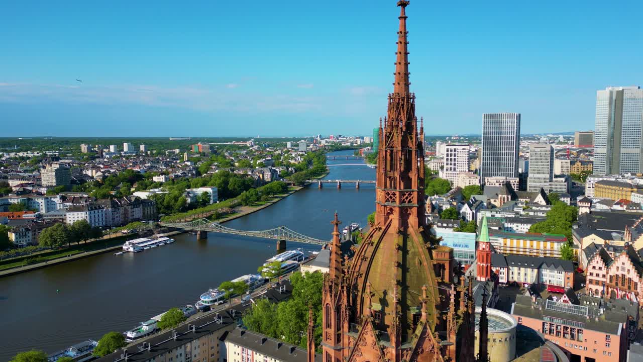 4K Aerial Drone Video of the Historic Kaiserdom St. Bartholomäus Church on the banks of the Main River in Downtown Frankfurt, Germany