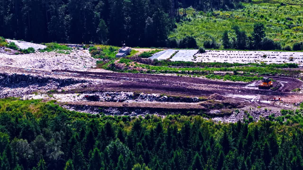 Environmental contamination land landfill garbage accumulation waste materials dump aerial drone