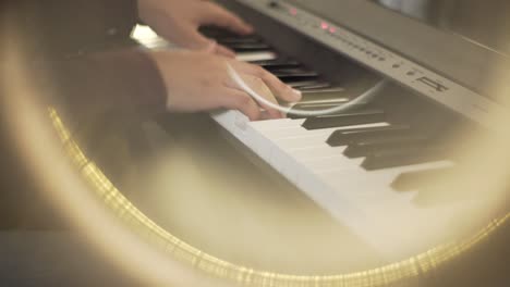 a man playing on piano in the theatre static shot, close up shot, insert shot