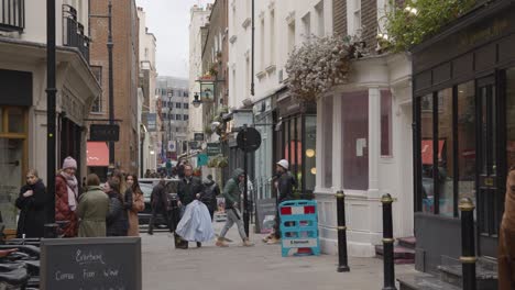 Shops-And-Restaurants-With-People-On-Avery-Row-In-Mayfair-London-UK-2