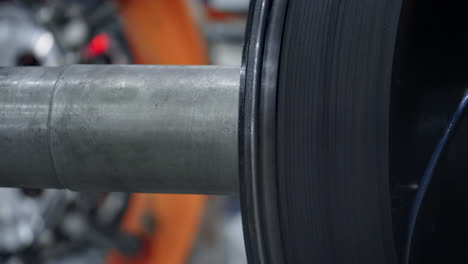 tyre production machine detail rotating in modern robotic factory close up