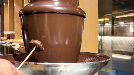 chocolate fountain with dipped treats