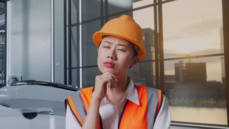 thoughtful engineer in modern office