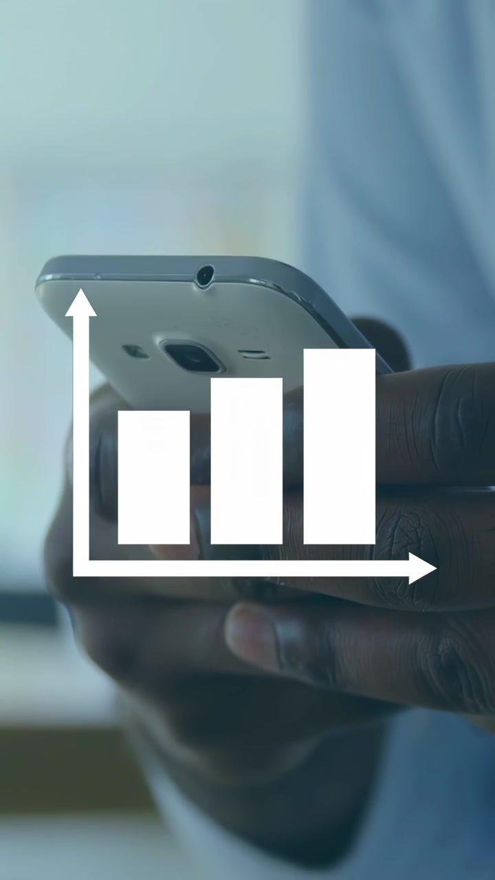 Vertical video: Man in shirt tapping phone, viewing finance metrics as bar-chart scaling over phone