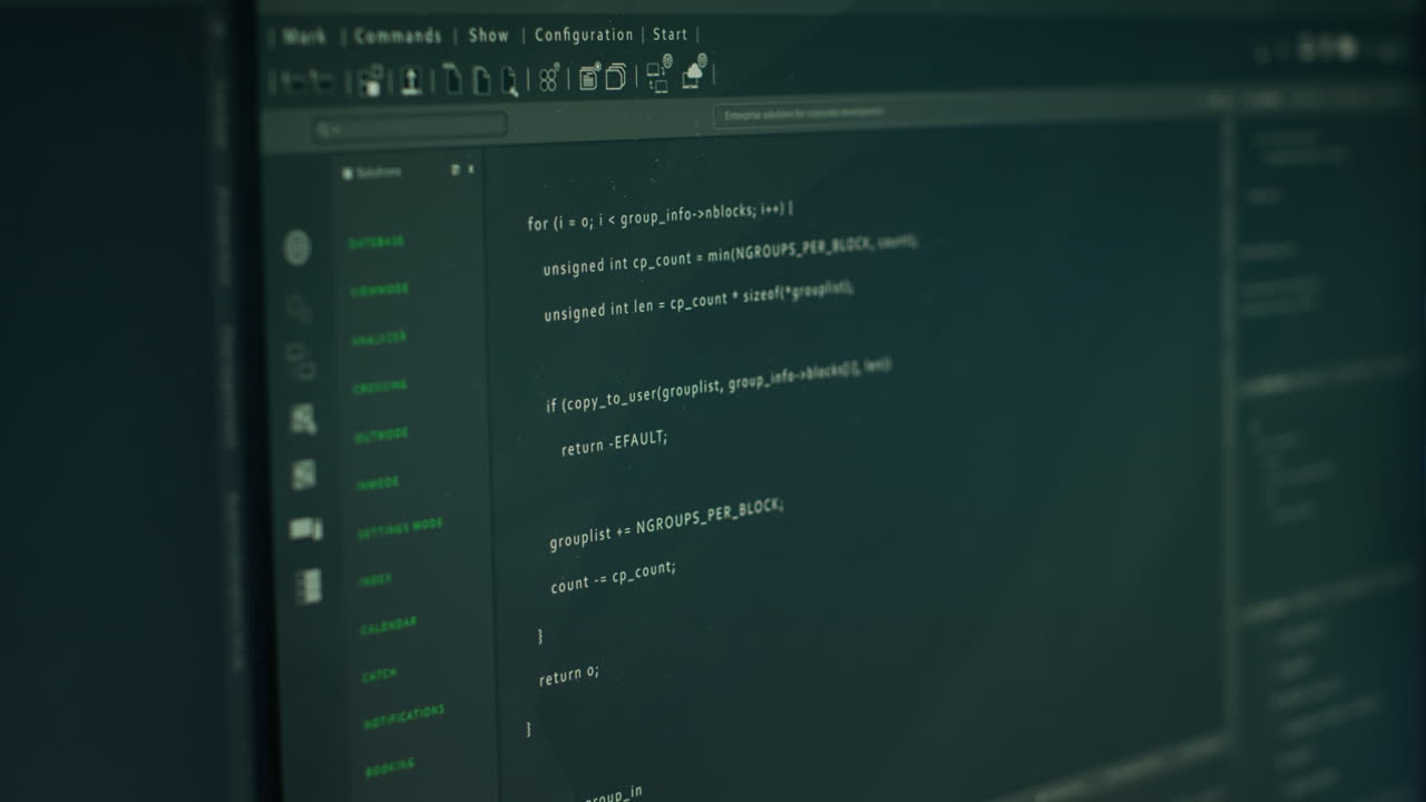 Close up of lines of code running on computer display in modern data center
