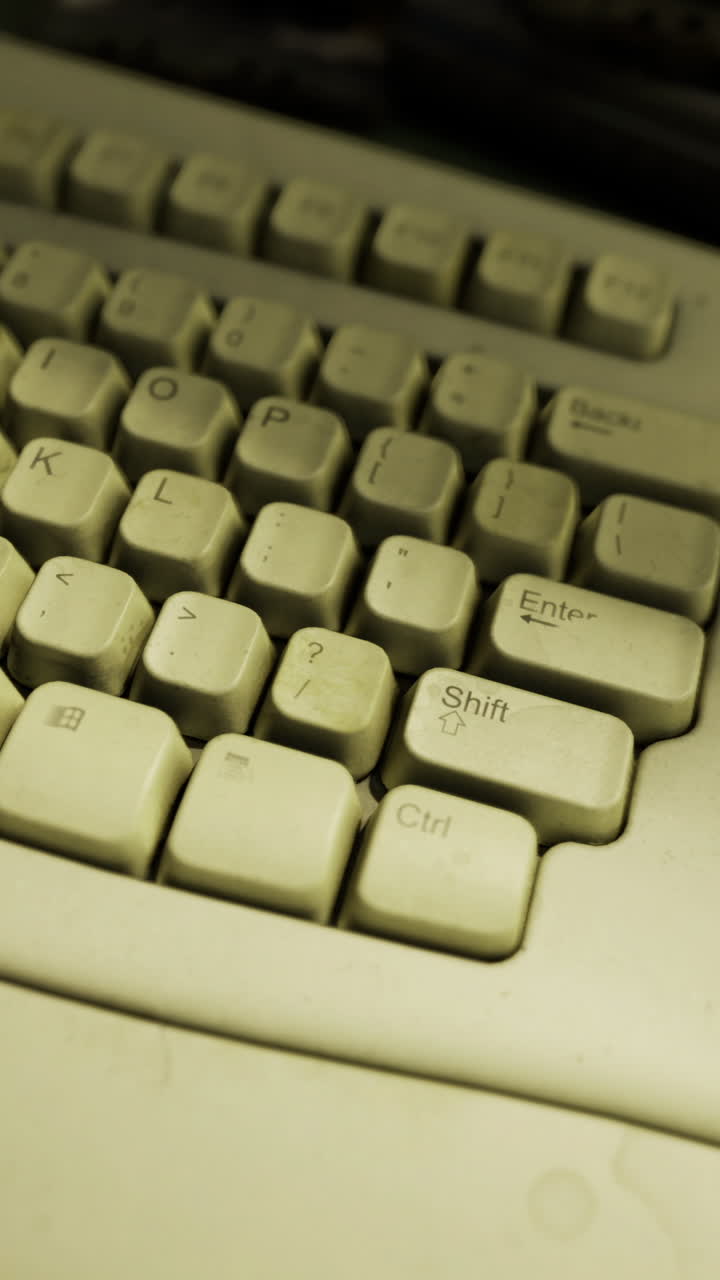 Old keyboard covered in dust reveals forgotten technology from the past