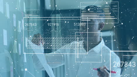 Animation of interface processing data over african american businessman working at office