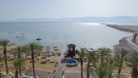 Hot-morning-on-the-shores-of-the-Dead-Sea-when-bathers-enjoy-the-water