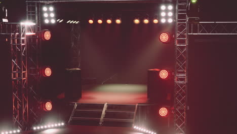 empty concert stage with red lighting