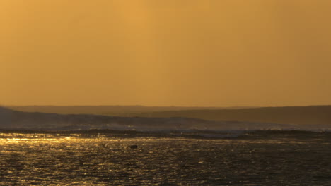 Ocean-with-strong-waves-at-sunset