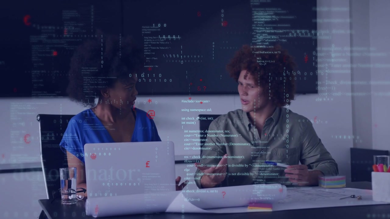 Two colleagues glancing and discussing tech plans while code overlay floating around hands