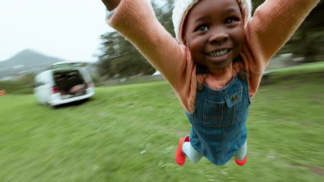 child, play or hands of parent spinning in circle