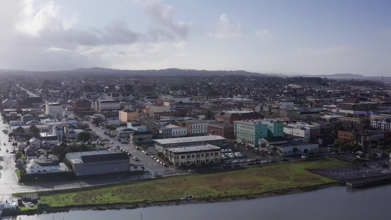 Low aerial close-up of historic downtown Eureka along the coast in Northern California. 4K