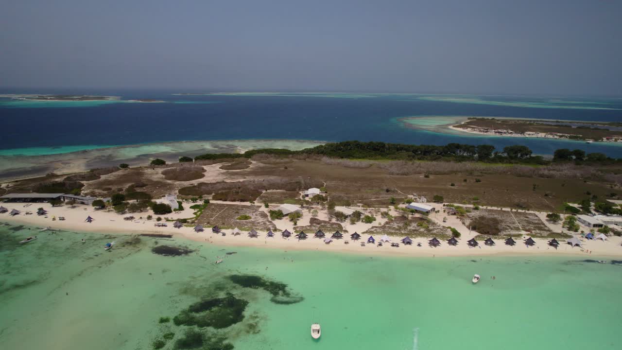 A bird’s-eye panoramic view over Madrisquí Island, a tropical archipelago in Los Roques, Venezuela.