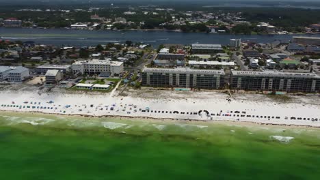aerial view of beachfront hotel buildings resorts on fort walton beach destin florida. waterfront beach resort rentals in fort walton beach, destin, florid