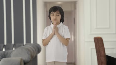 Cute-Indian-boy-praying-to-God