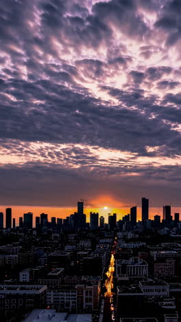 dramatic sunset over a city skyline