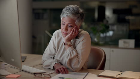 tired woman at desk