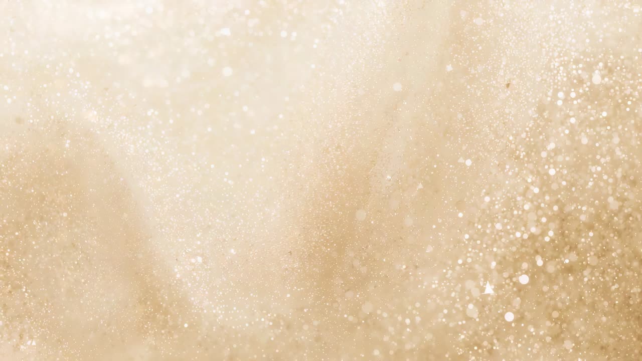 Following lateral shift, golden beige particles drifting right in macro, bokeh highlights twinkling