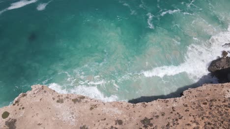 Drone-aerial-looking-down-into-the-Great-Australian-Bight-with-crashing-waves