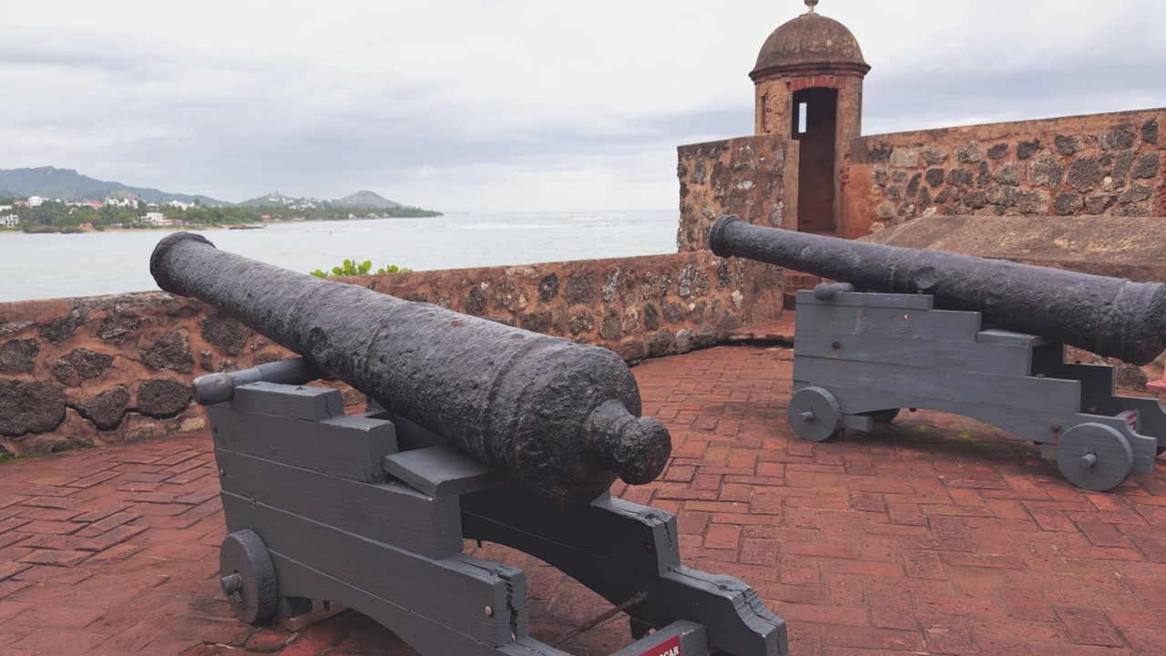 Antique colonial cannon on display at Fortaleza San Felipe, a historic fortress in Puerto Plata, Dominican Republic