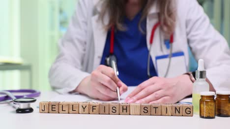 doctor with 'jellyfish sting' blocks and medical supplies
