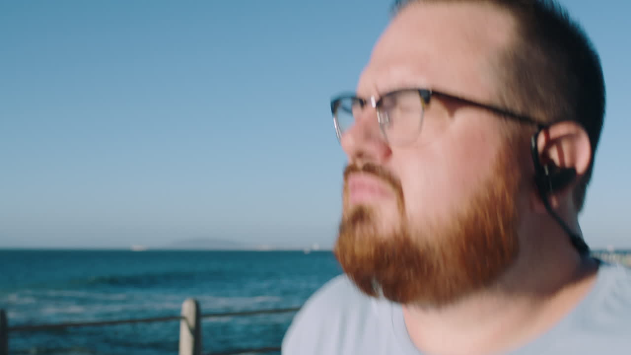 Man Running on the Beach