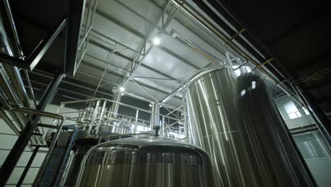 modern craft brewery. craft beer production. modern equipment in brewery, metal tanks, alcoholic drink production