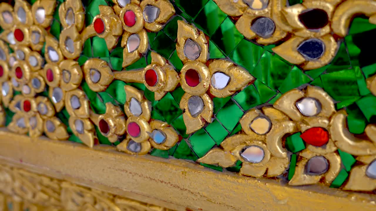 Slow motion over the details of Wat Pho temple in Bangkok. Close-ups of intricate details. Perfect for travel, cultural, and religious themed projects.
