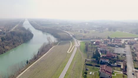 aerial view of a river and village in the countryside