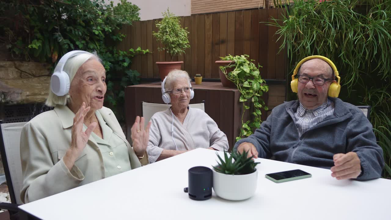 Seniors enjoying music with headphones