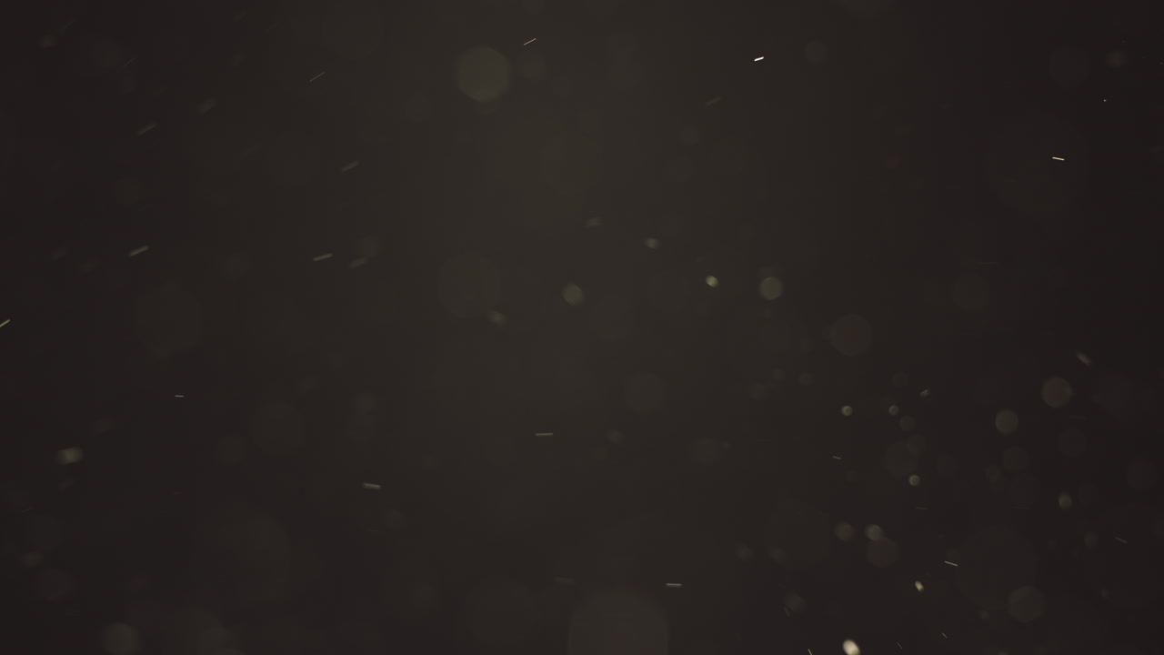 먼지 입자가있는 어두운 배경