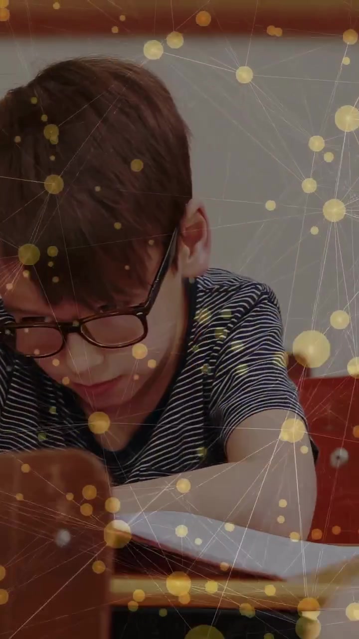 Vertical video: Camera panning, girl leaning, boy writing over notebook, overlay showing education