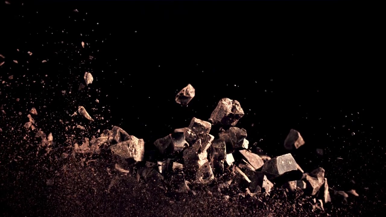 Slow Motion Explosion of Chocolate Chunks and Cocoa Powder