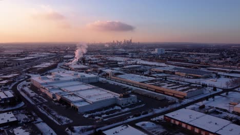 a steaming factory in the winter industrial area